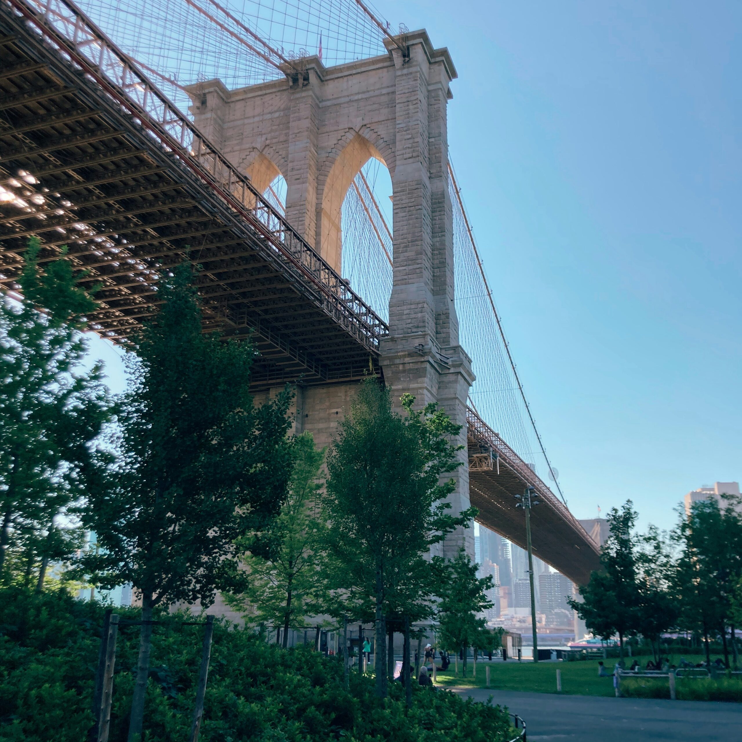 Stunning upward view of the Brooklyn Bridge from the Brooklyn side in New York City