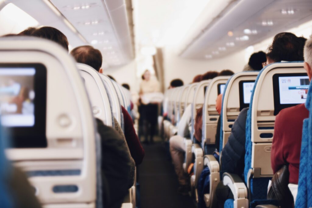 Passengers seated inside a plane, waiting for takeoff