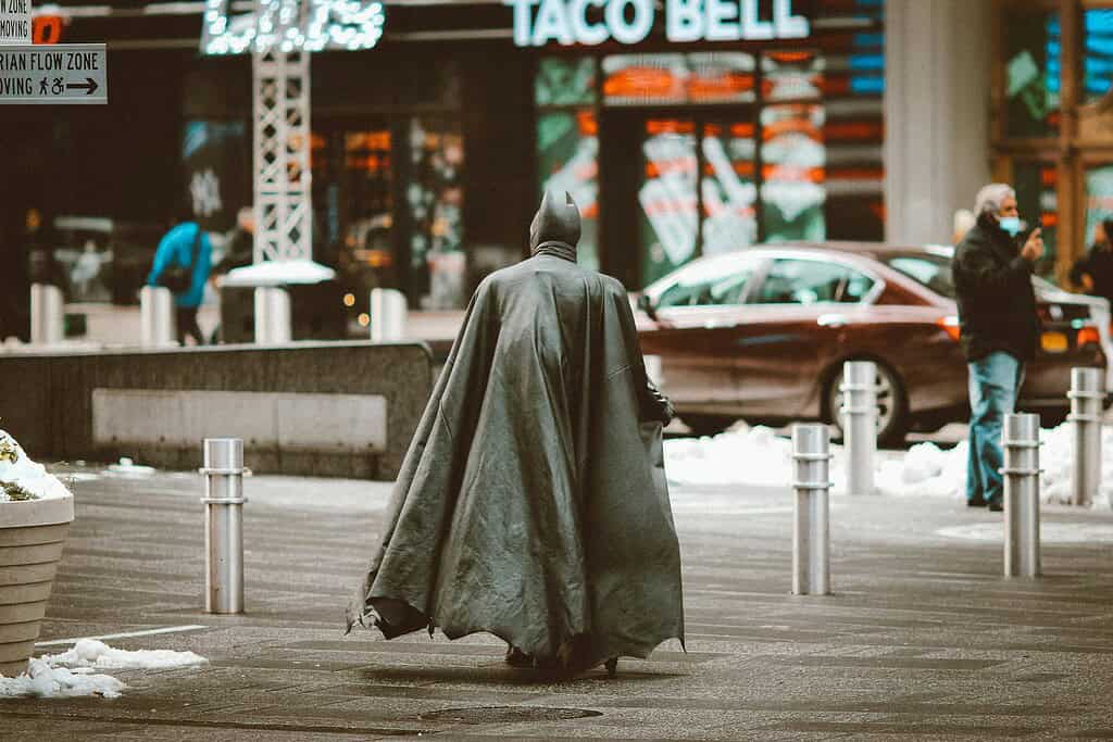 Man dressed as Batman in Times Square targeting tourists for photo tips in NYC
