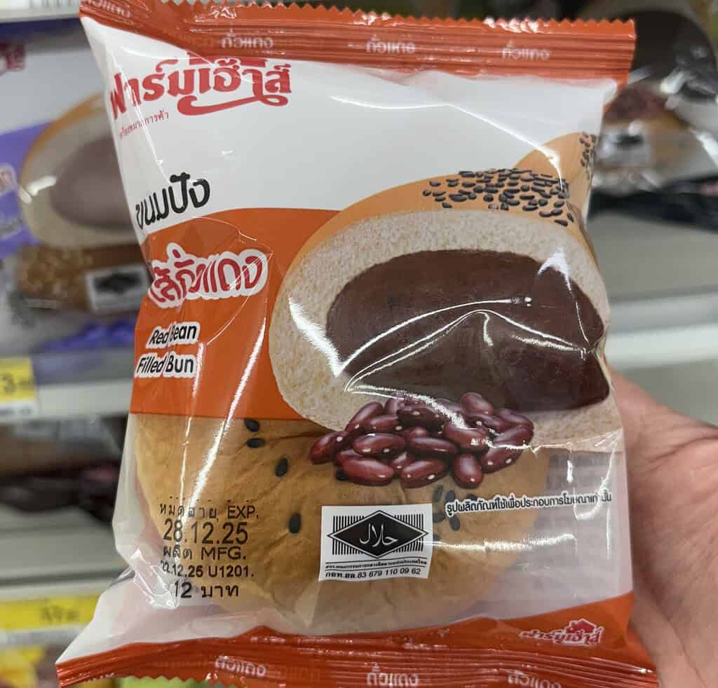 Red bean-filled soft bun from Thailand 7-Eleven, a popular sweet snack with a smooth, mildly sweet bean paste filling.
