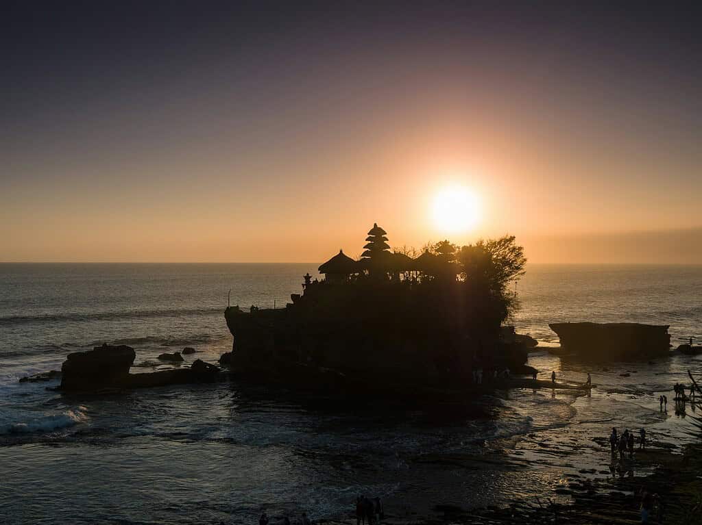 views of Tanah Lot at sunset in Bali