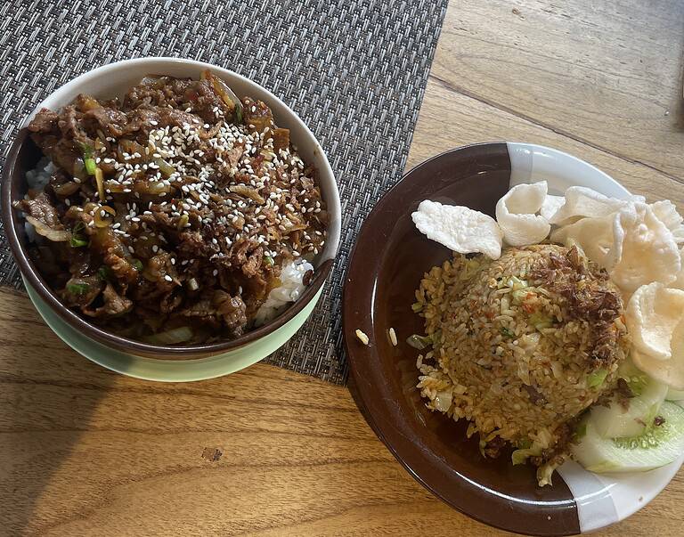 two different Balinese plates served at a local restaurant in Bali