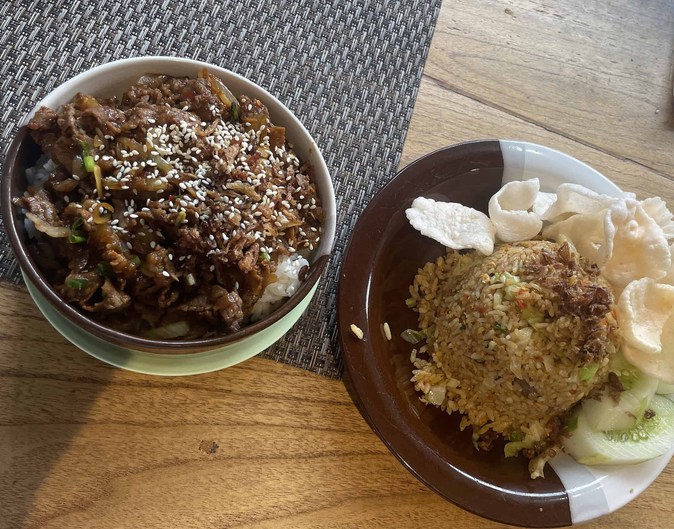 two different Balinese plates served at a local restaurant in Bali