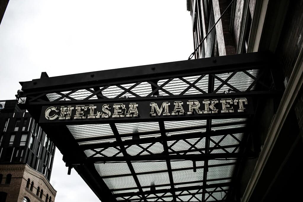sign for the Chelsea Makret in NYC outisde