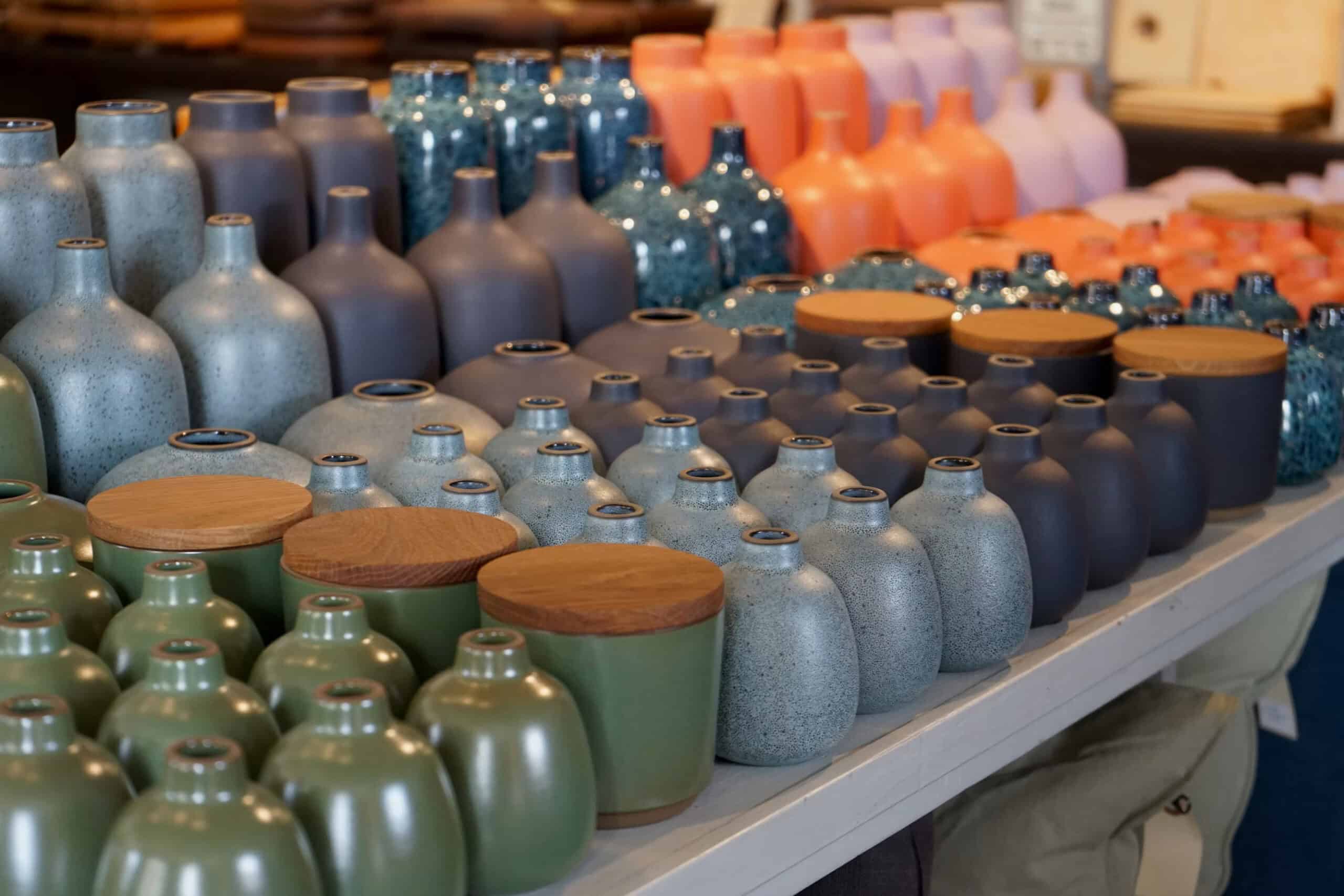 several Japanese ceramics displayed in a shop