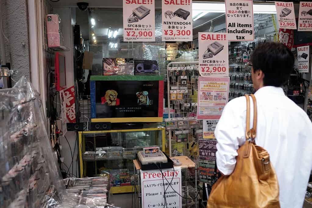 a man browsing electronics in Akihabara, Tokyo